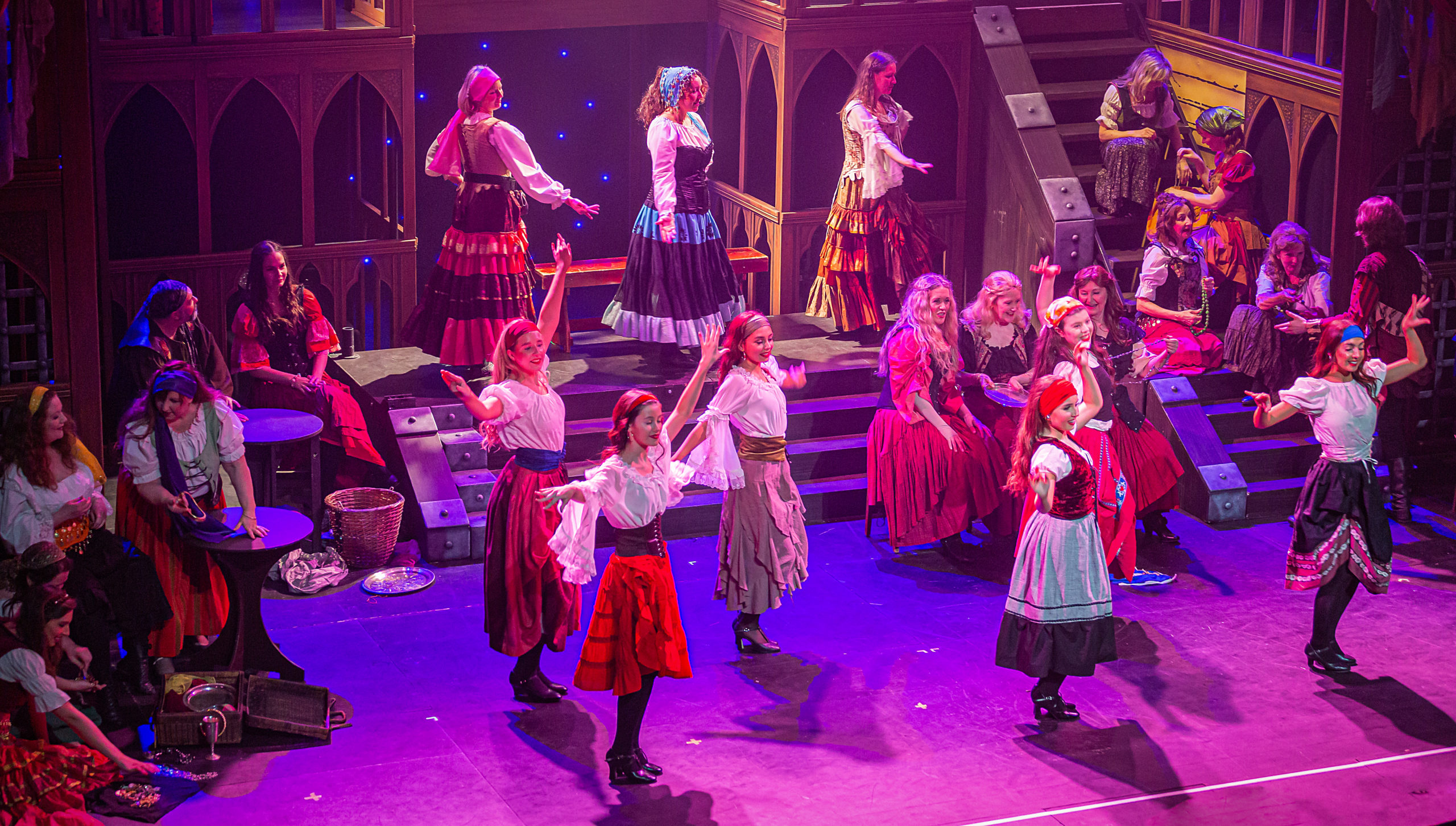 DMTC performers on stage in The Hunchback of Notre Dame (2023)